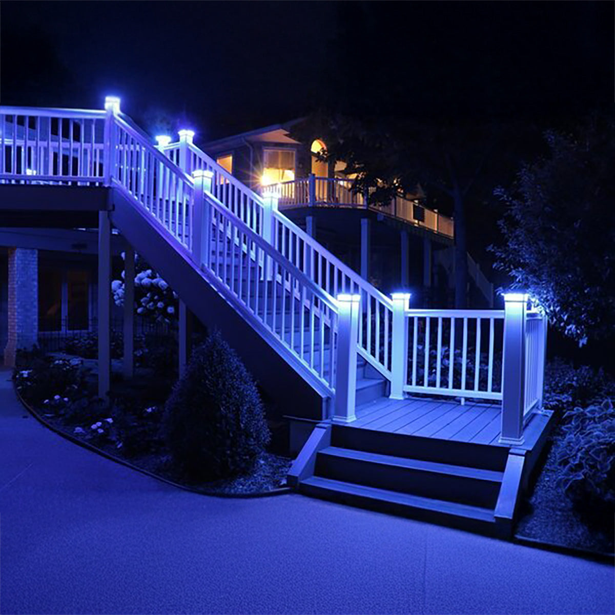Staircase with blue LED lights on a deck at night