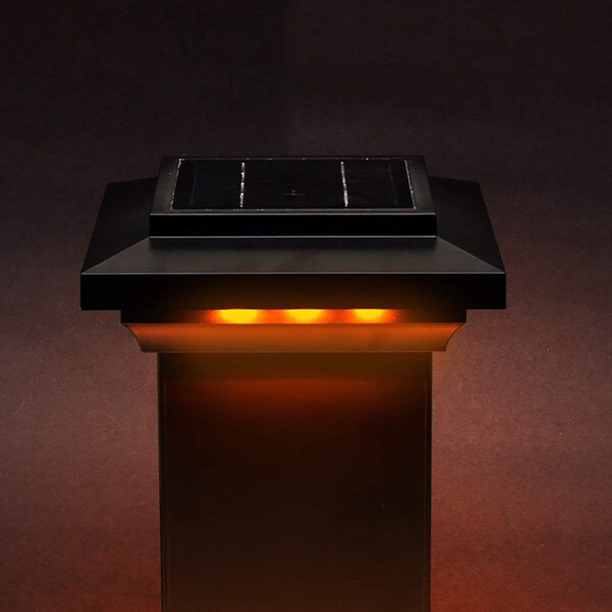 Solar-powered outdoor light on a dark background