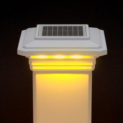 Solar-powered outdoor light fixture with a dark background