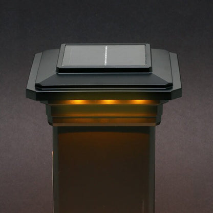 Solar-powered outdoor light fixture on a dark background